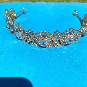 A CLEAR crystal & GOLD Bridal Crown piece that is gorgeous!! Was never worn!